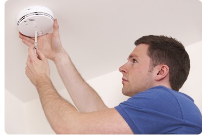 carbon monoxide detector being installed